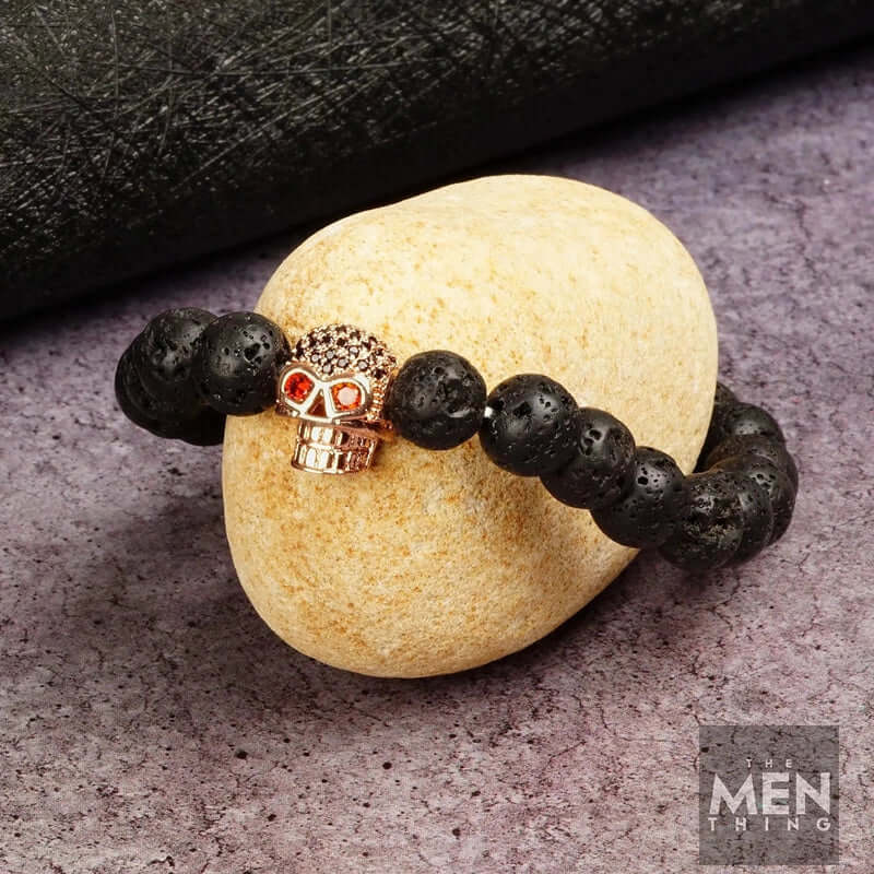 THE MEN THING Bead Bracelet INTERNO SKULL - Natural Beads Bracelet - Rose Gold Toned Skull with Red Stone in Eyes (7inch)