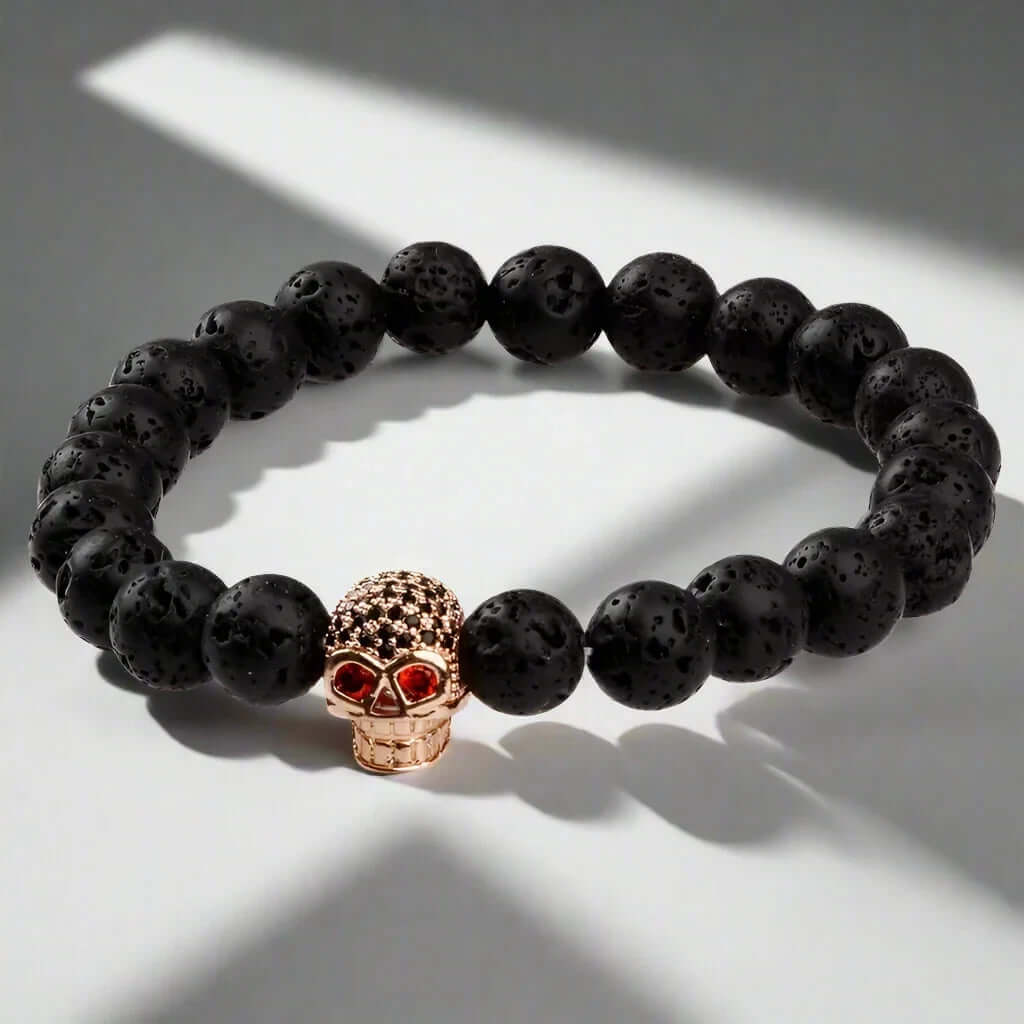THE MEN THING Bead Bracelet INTERNO SKULL - Natural Beads Bracelet - Rose Gold Toned Skull with Red Stone in Eyes (7inch)