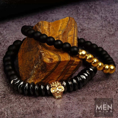 THE MEN THING Bead Bracelet LAVA EMBRACE SKULL DUO - Gold Toned- Beads Bracelet with Natural Volcanic Stone - 7inch Stretch Bracelet