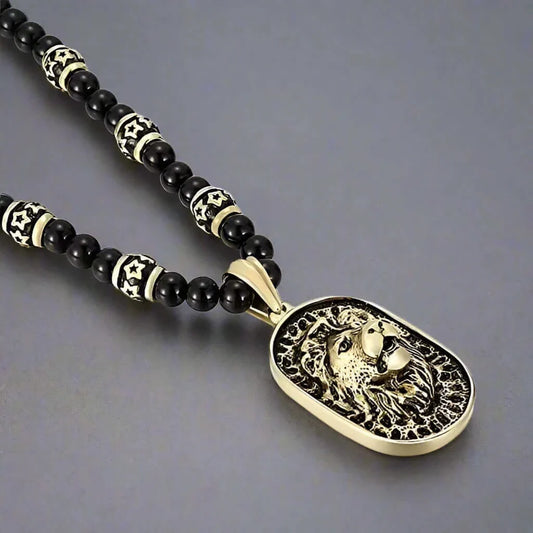 THE MEN THING SS Pendant with Chain WARRIOR NECKWEAR - Pure Titanium Steel Lion Head Shield 18K Pvd Gold Plated Necklace with 8mm Black Onyx Beads 27inch Chain for Men & Boys